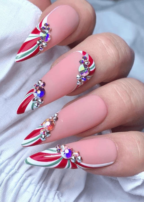 Pin wheel Christmas nail design with rhinestones