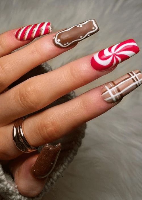 Brown and red Christmas nail design with a candy cane and plaid design