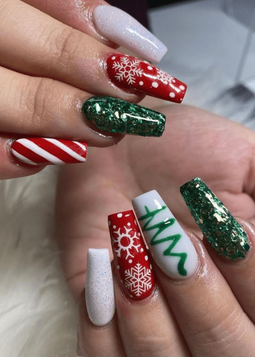 Red white and green Christmas nail design with snowflakes