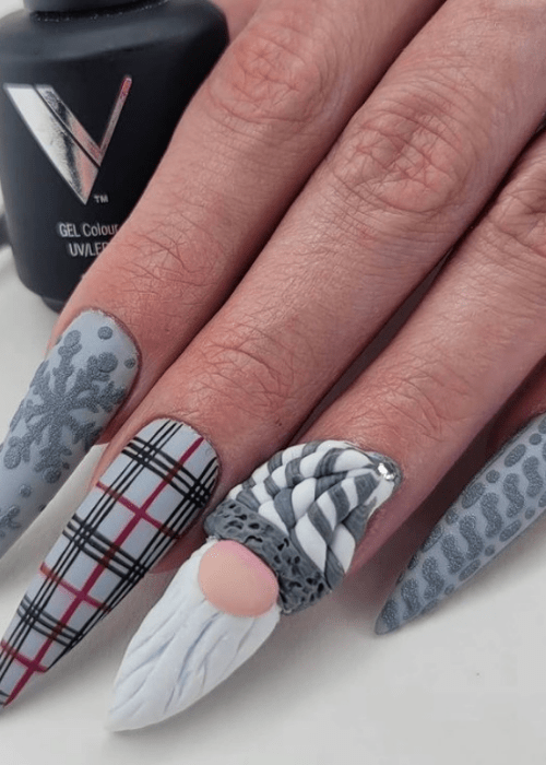 Grey Christmas nail art with an acrylic Gnome and plaid design