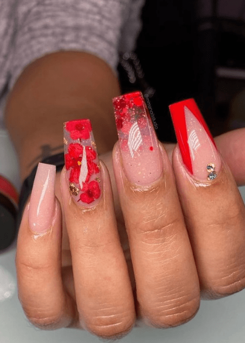 Christmas nail design with poinsettias