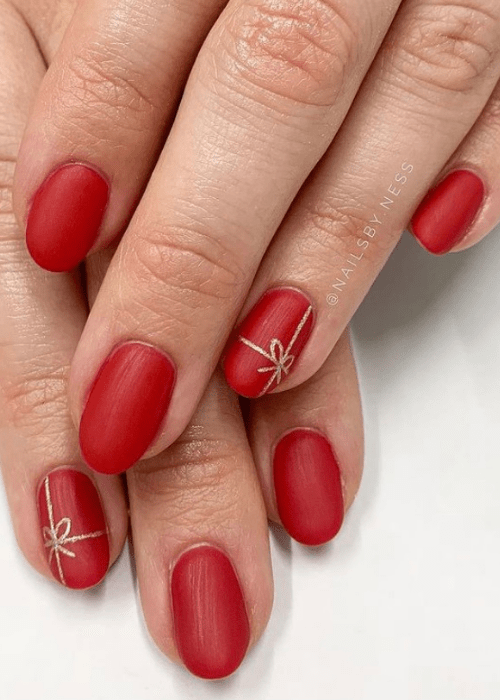 Christmas nail design with red nails as presents