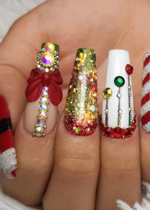 A sparkly Christmas nail design with a bow