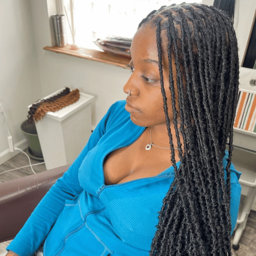 Black soft locs a braid hairstyle