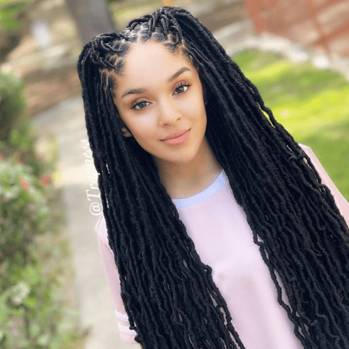 Long black soft locs a braid hairstyle