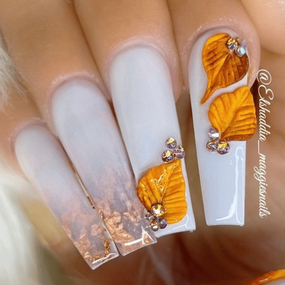 An incredible list of various fall-inspired nail designs you will enjoy. The fall nail ideas will inspire you to try them yourself. #fallnails #fallnails2021 #fallnaildesigns #fallcolors #fallacrylic