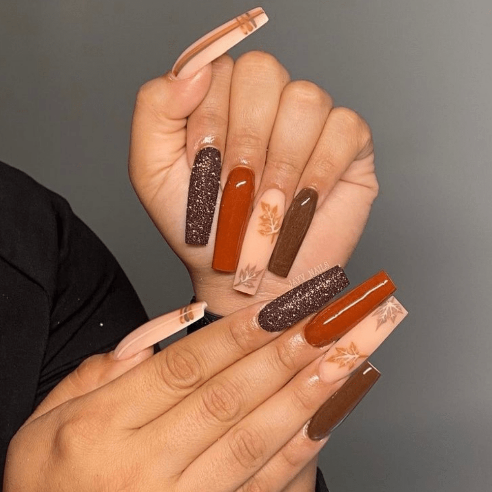 An incredible list of various fall-inspired nail designs you will enjoy. The fall nail ideas will inspire you to try them yourself. #fallnails #fallnails2021 #fallnaildesigns #fallcolors #fallacrylic