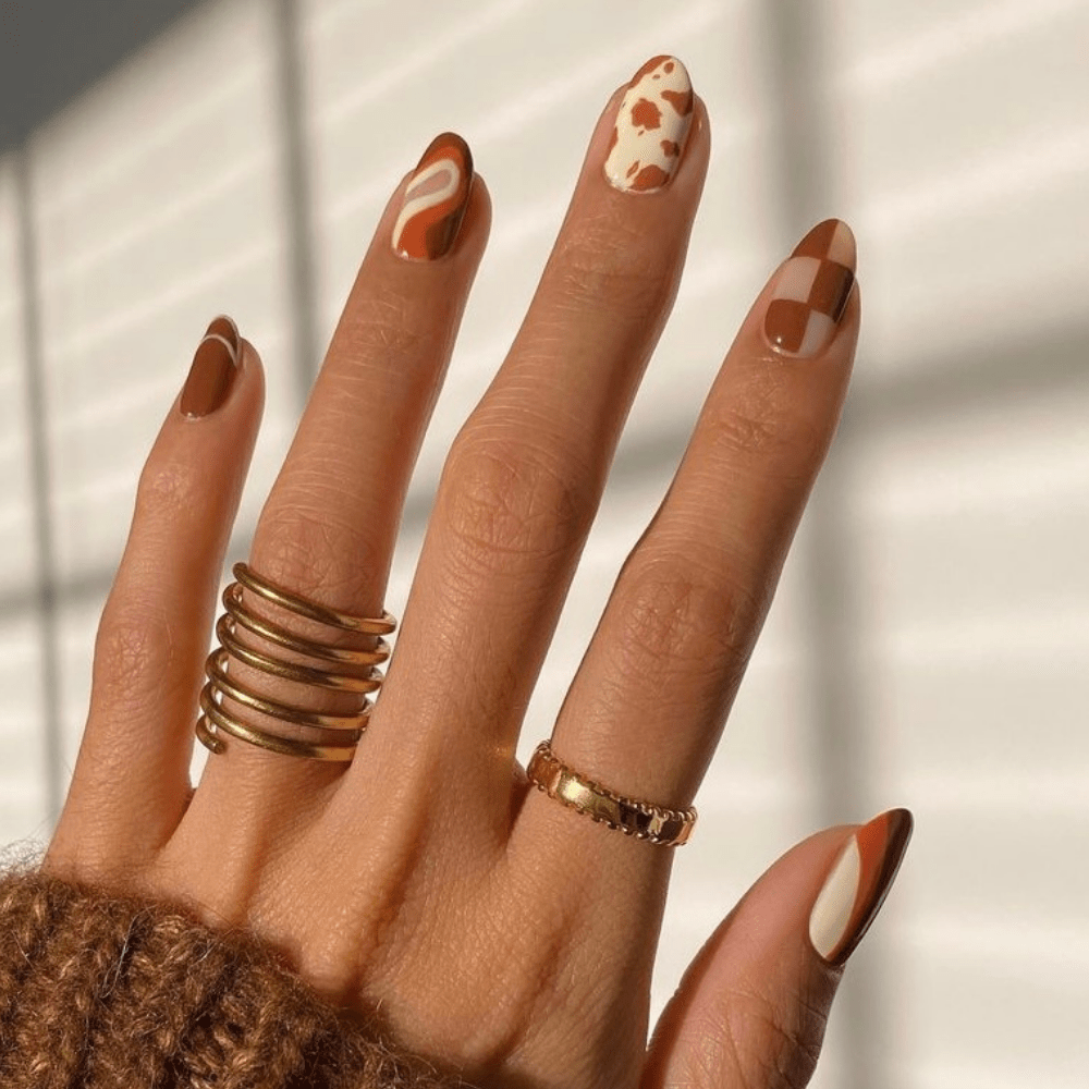 An incredible list of various fall-inspired nail designs you will enjoy. The fall nail ideas will inspire you to try them yourself. #fallnails #fallnails2021 #fallnaildesigns #fallcolors #fallacrylic