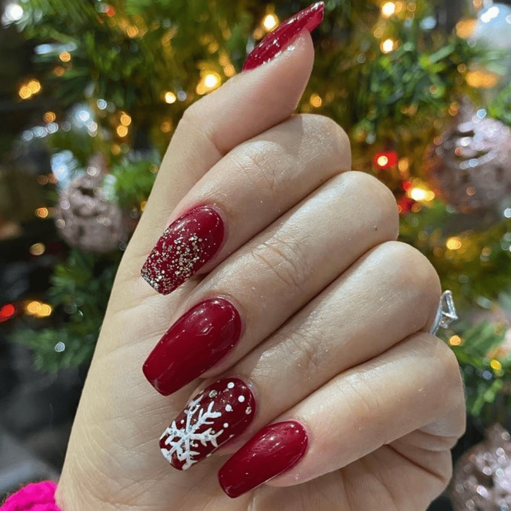 Red nails with a snowflake