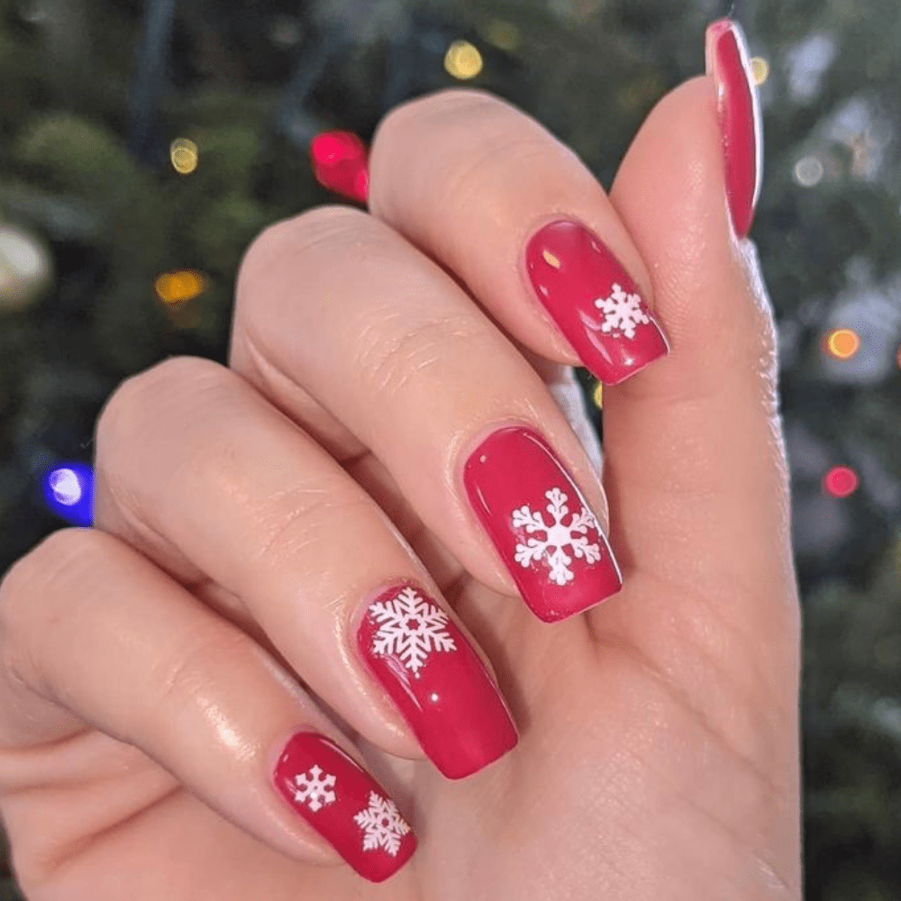 Red nails with snowflakes