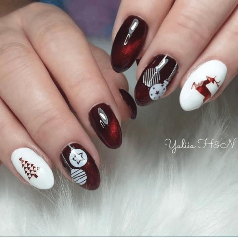 Christmas nail design with ornaments and trees