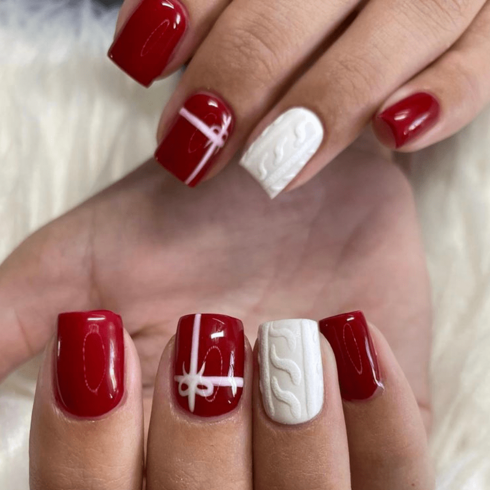 Nail design with a sweater and a present