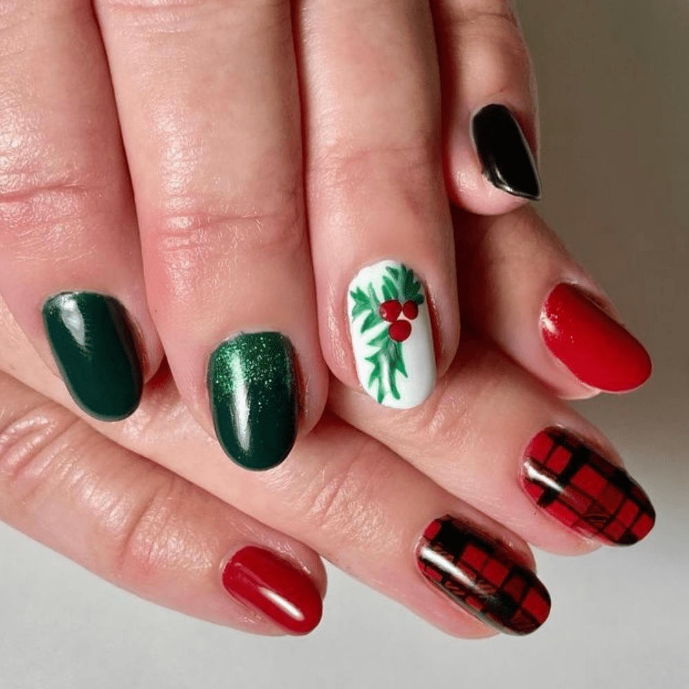 A mistletoe and red plaid nail design