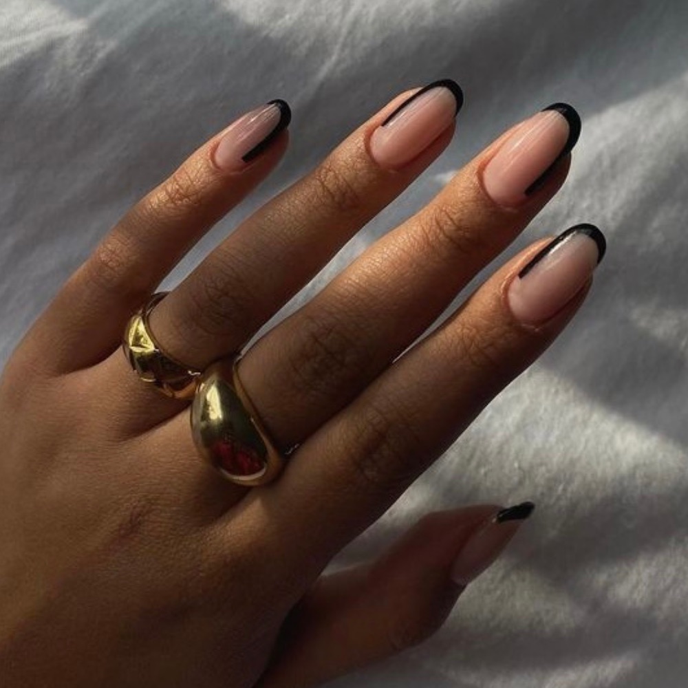 A long tip french tip in black