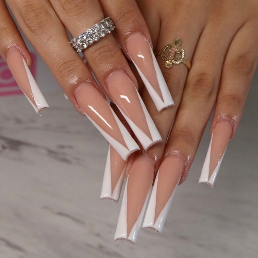 Long acrylic nails with white V-shaped French tips